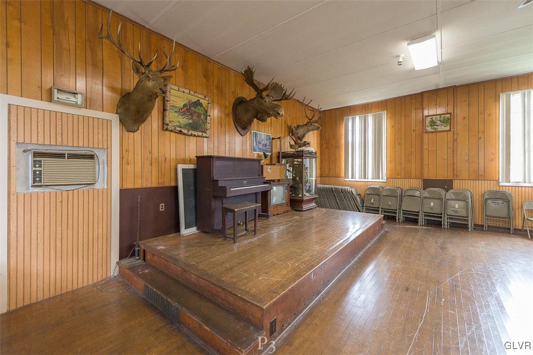 474 Sportsman Club Road Nazareth, PA 18064 - Photo 5 of 14 a living room with furniture pool table and large windows