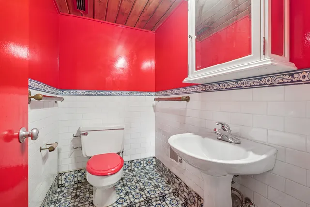 a bathroom with a sink and a toilet