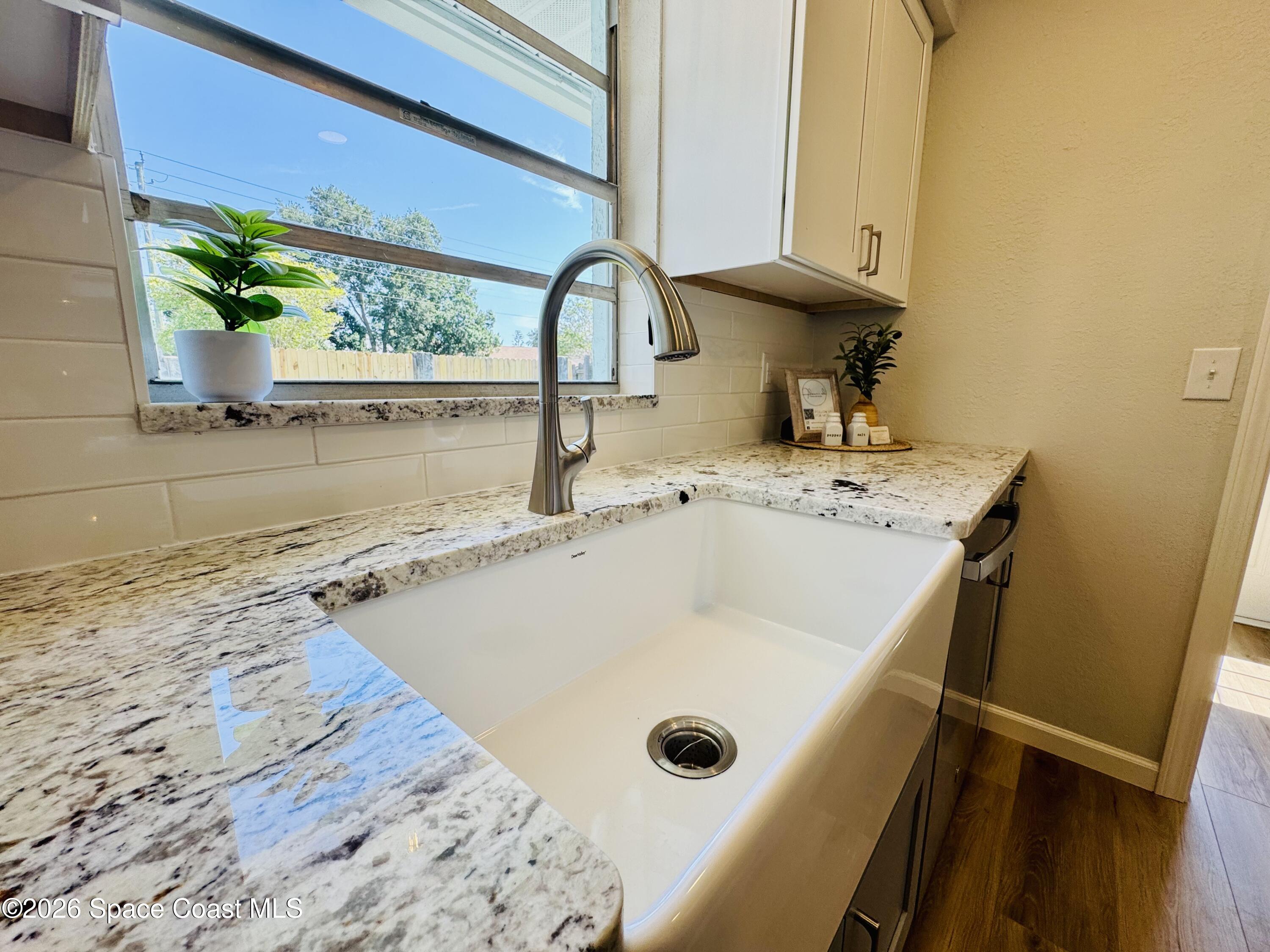 1910 Tallridge Road Melbourne, FL 32935 - Photo 8 of 34 Farmhouse sink close-up