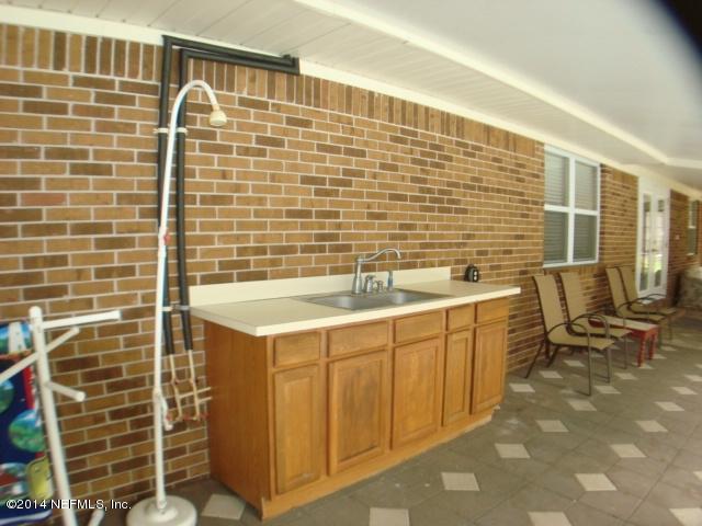 3980 Heidi Road West Jacksonville, FL 32277 - Photo 12 of 46 a bathroom with a sink and a mirror