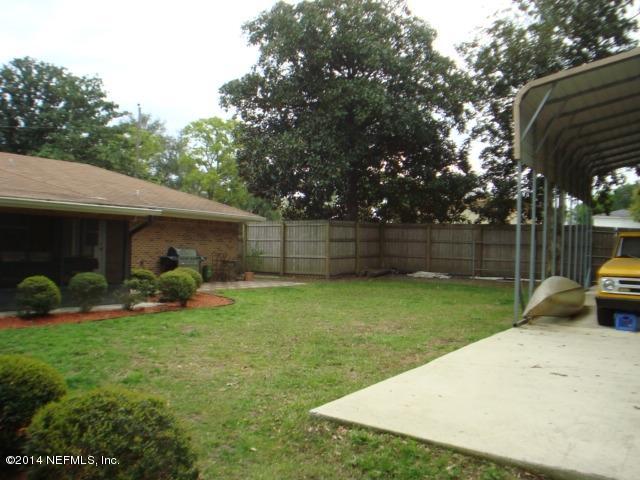 3980 Heidi Road West Jacksonville, FL 32277 - Photo 2 of 46 a view of a house with backyard and sitting area
