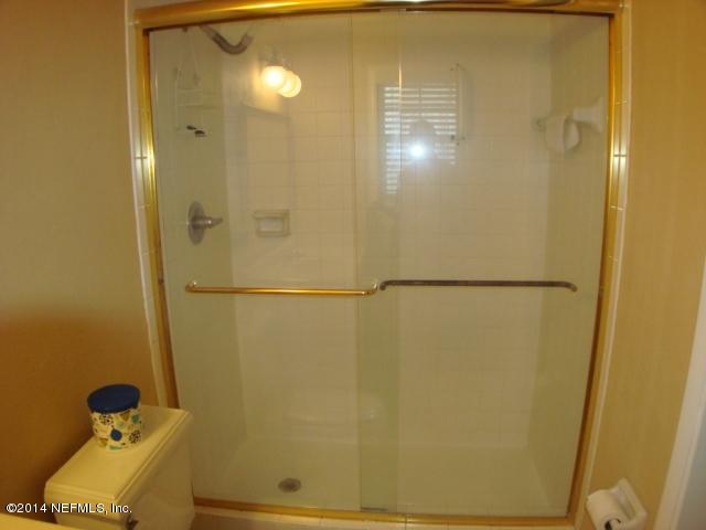 3980 Heidi Road West Jacksonville, FL 32277 - Photo 32 of 46 a bathroom with a shower