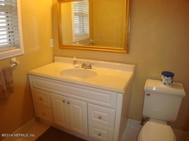 3980 Heidi Road West Jacksonville, FL 32277 - Photo 33 of 46 a bathroom with a sink and a toilet