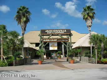 3980 Heidi Road West Jacksonville, FL 32277 - Photo 43 of 46 a view of a building with a tree