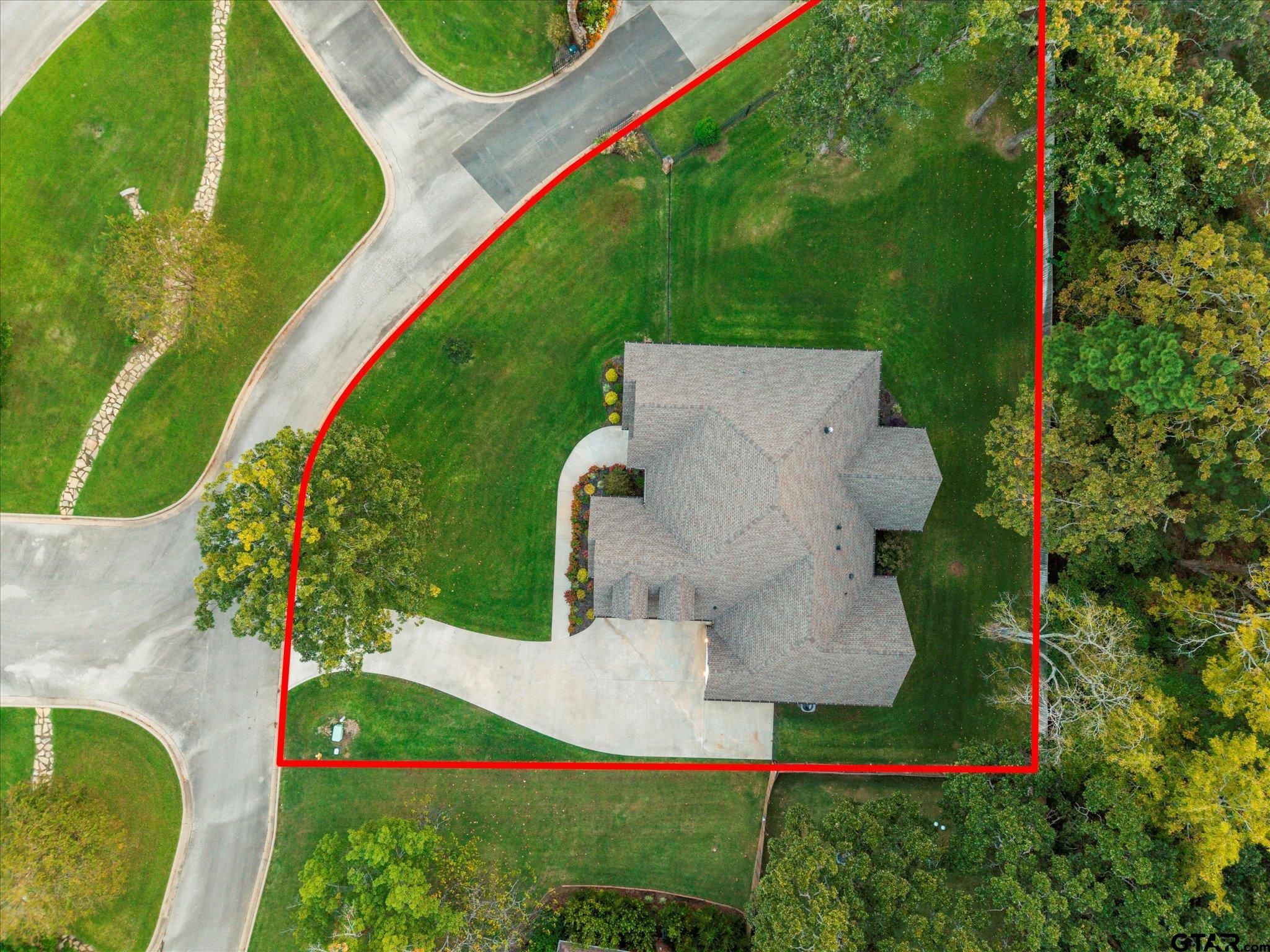 4301 Windrush Boulevard Longview, TX 75604 - Photo 35 of 36 an aerial view of a house