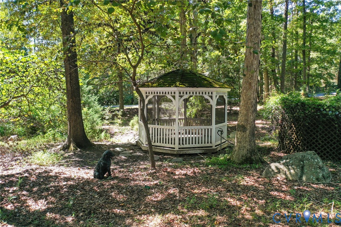 321 1st Flite Lane Manakin-Sabot, VA 23103 - Photo 10 of 11 a view of a bench in the backyard