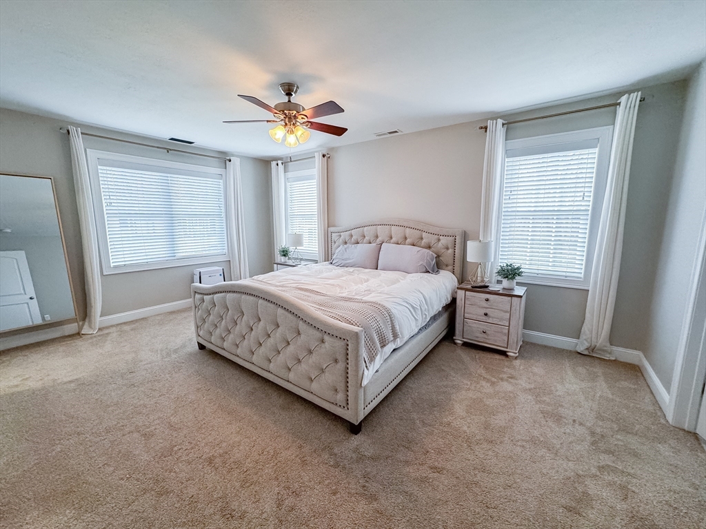 23 Ralph Street Chicopee, MA 01020 - Photo 18 of 42 a bedroom with a bed dresser and a window