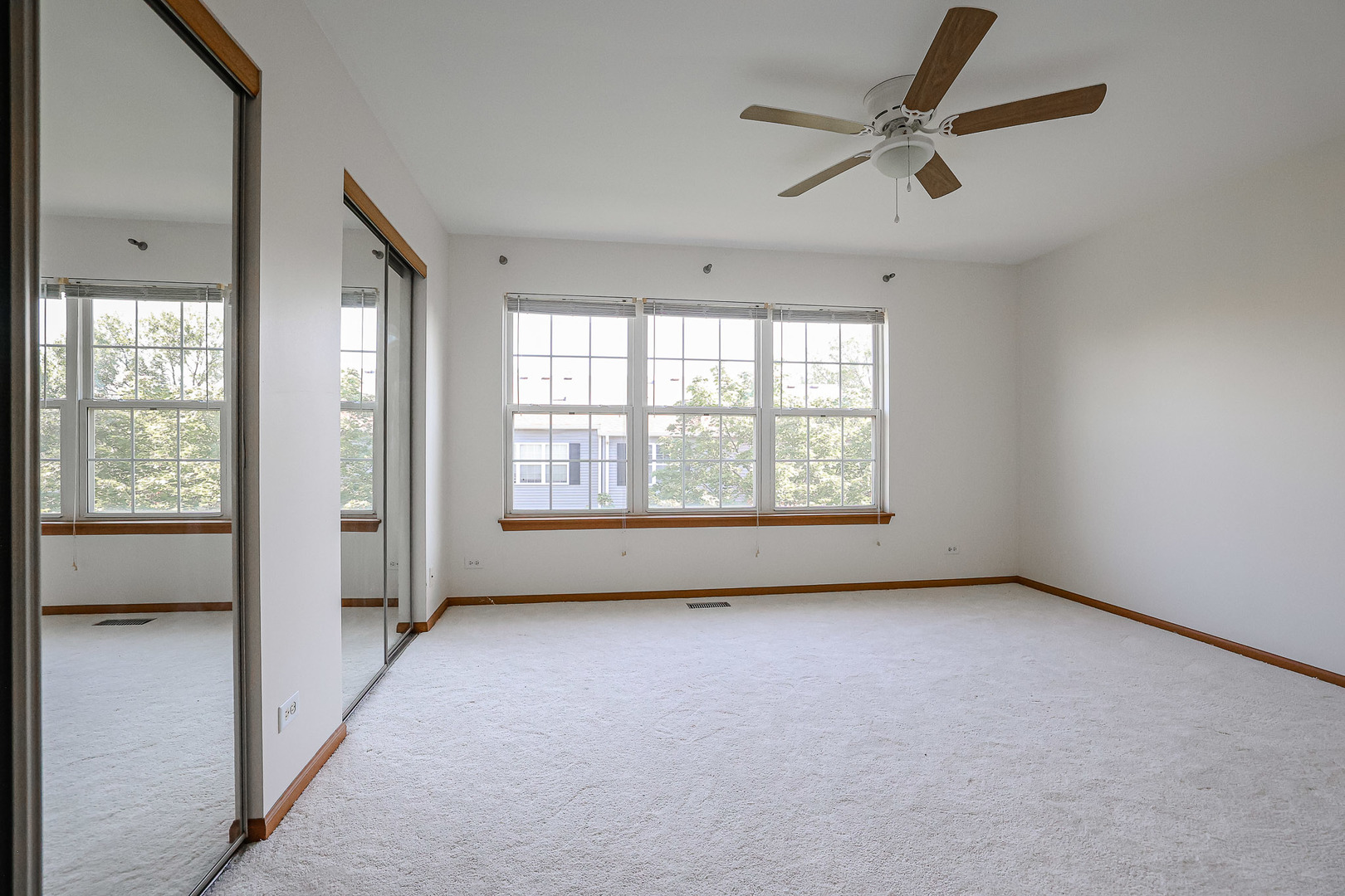 2439 Oneida Lane Naperville, IL 60563 - Photo 17 of 25 a view of an empty room with a window