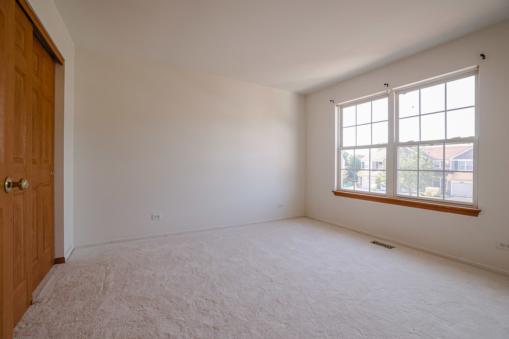 2439 Oneida Lane Naperville, IL 60563 - Photo 21 of 25 an empty room with a window