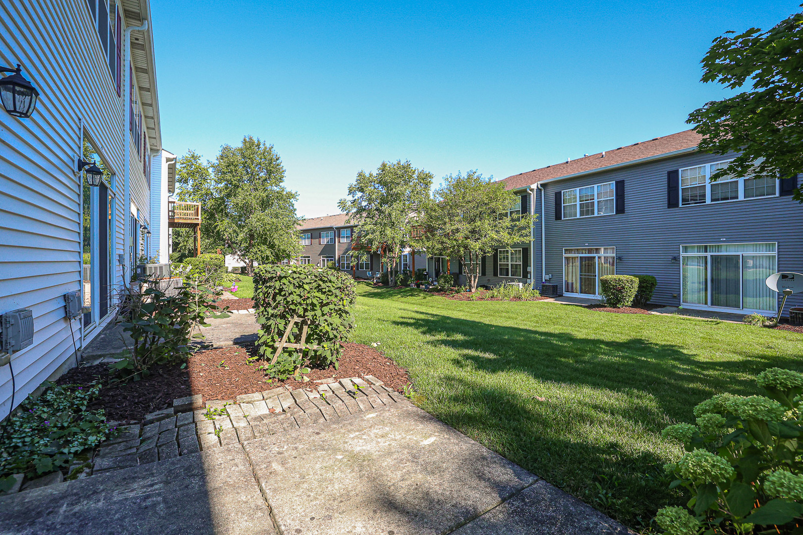 2439 Oneida Lane Naperville, IL 60563 - Photo 25 of 25 a view of a house with a yard