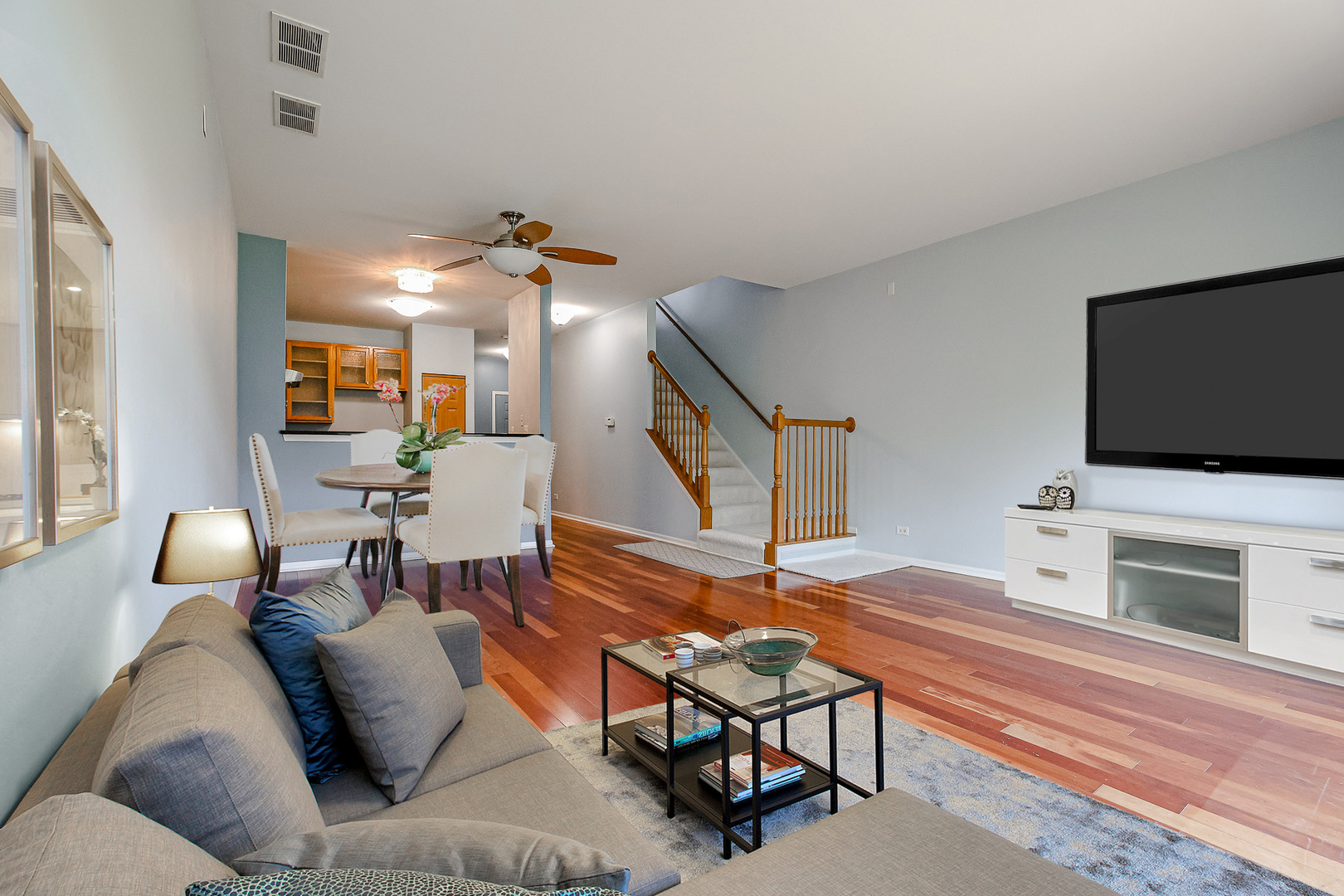 2439 Oneida Lane Naperville, IL 60563 - Photo 9 of 25 a living room with furniture and a flat screen tv