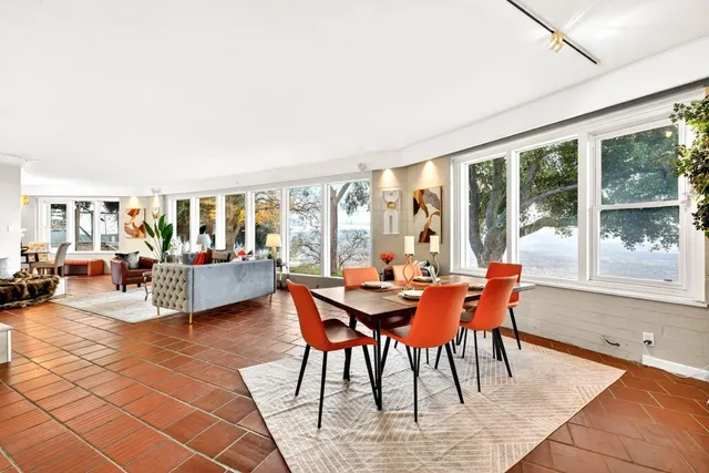 an aerial view of a house with a garden