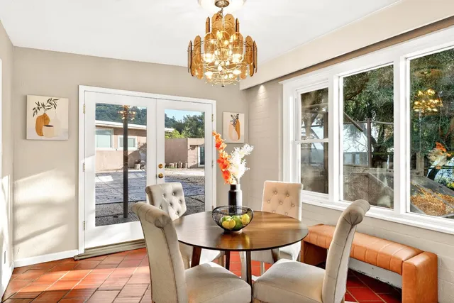 a room with furniture and a large window