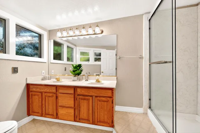 an aerial view of a houses with sky view