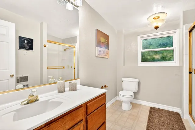 a view of a city with mountains in the background