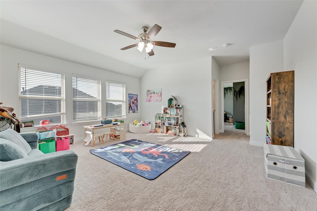 1279 Altuda Drive Forney, TX 75126 - Photo 23 of 35 a living room with furniture and a large window