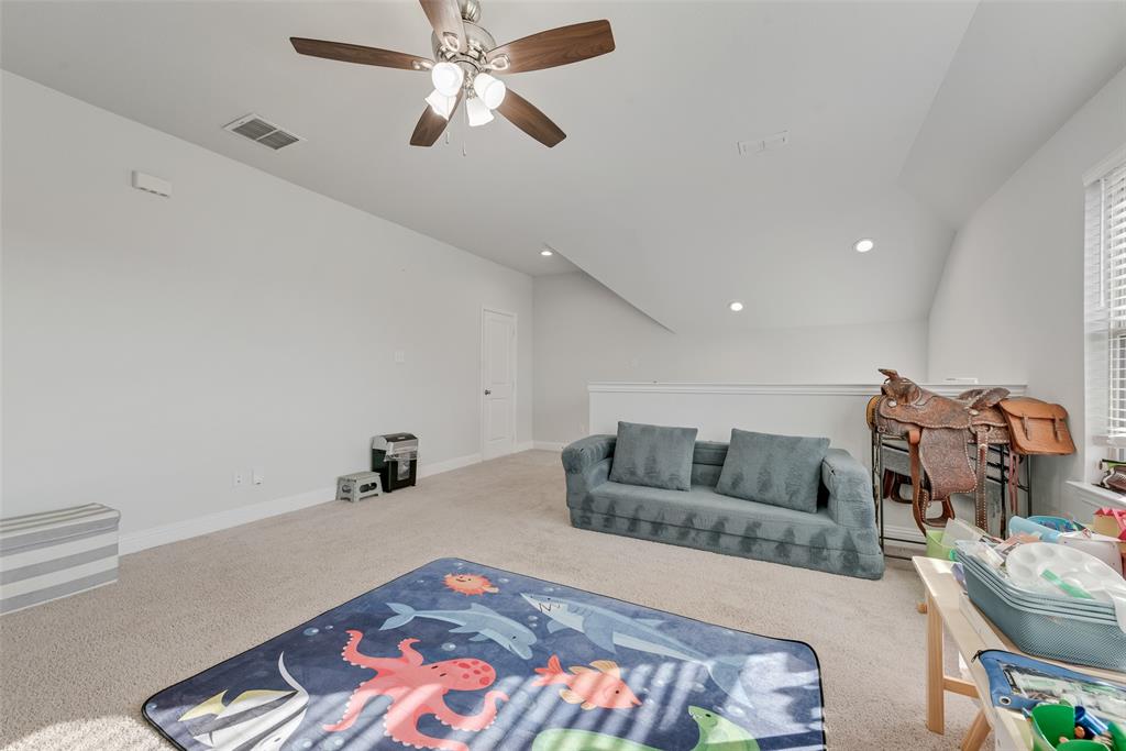 1279 Altuda Drive Forney, TX 75126 - Photo 24 of 35 a living room with furniture and a wooden floor