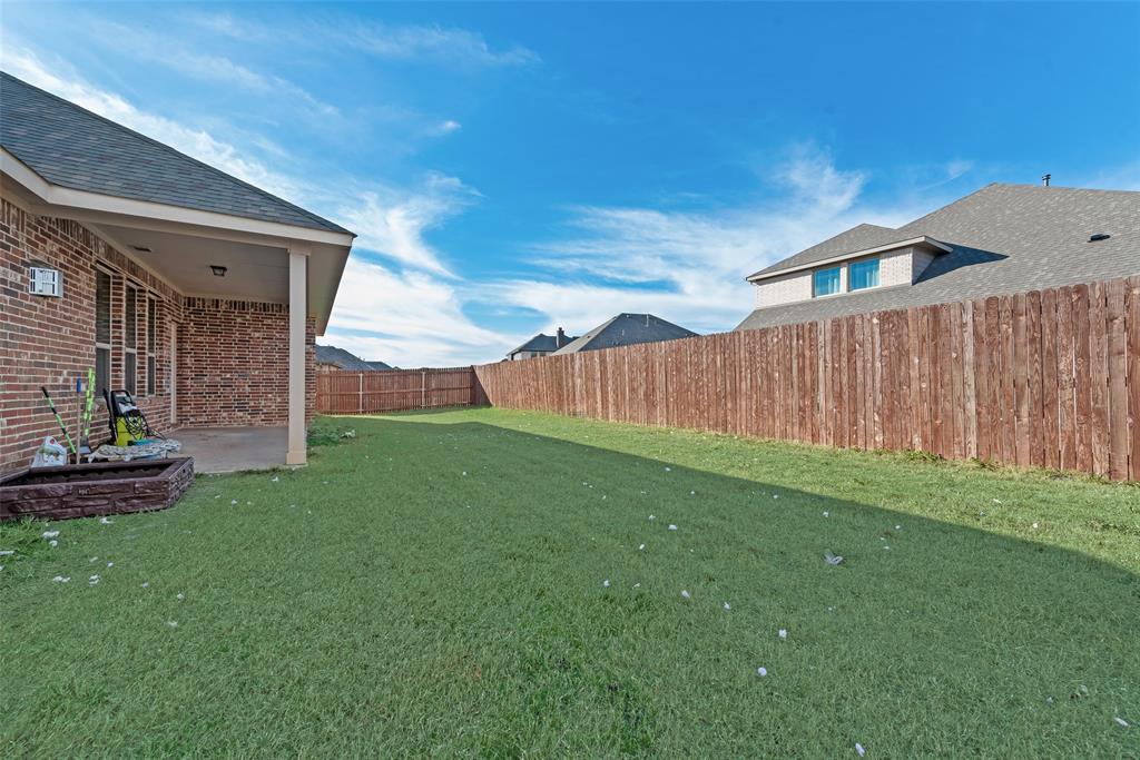 1279 Altuda Drive Forney, TX 75126 - Photo 27 of 35 a view of a backyard with wooden fence