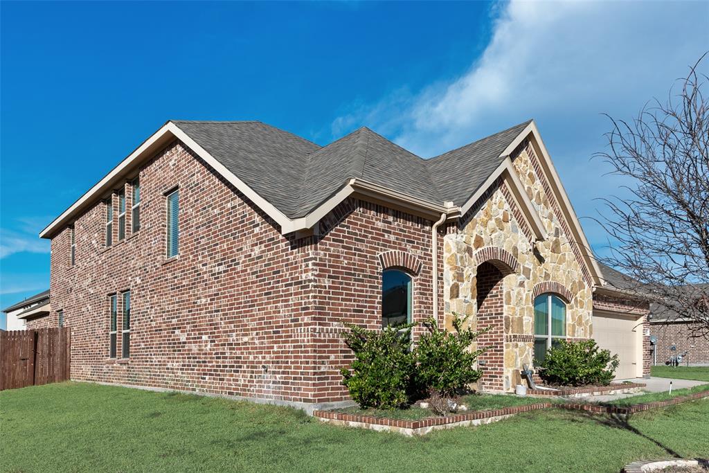 1279 Altuda Drive Forney, TX 75126 - Photo 29 of 35 a front view of a house with a yard