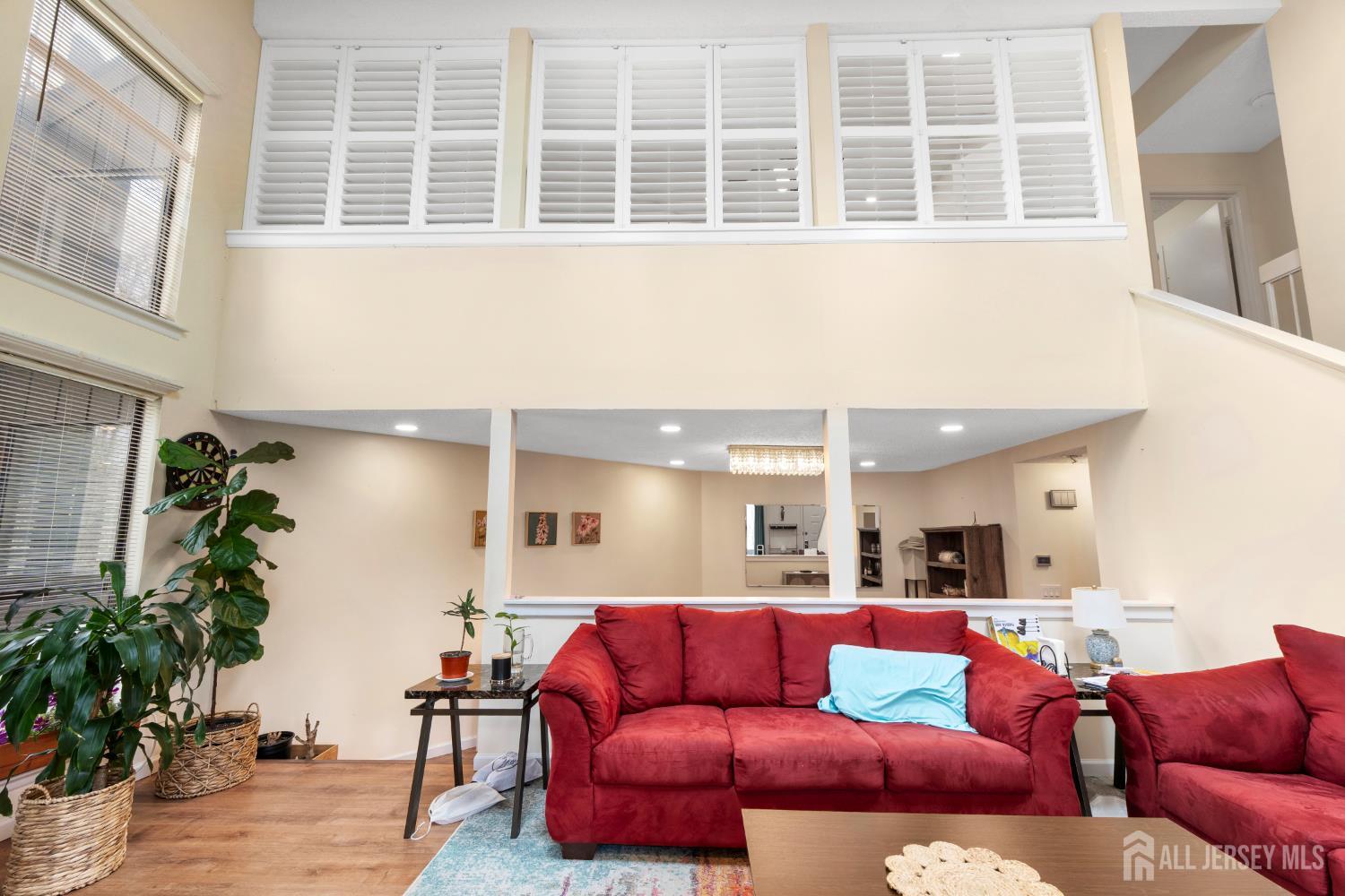 272 Westgate Drive Edison, NJ 08820 - Photo 11 of 47 a living room with furniture and a potted plant