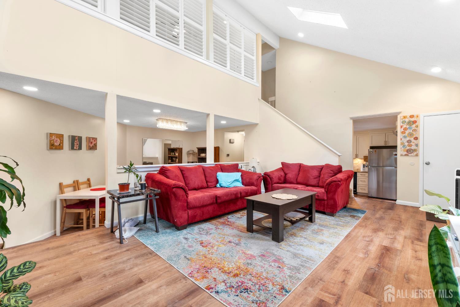 272 Westgate Drive Edison, NJ 08820 - Photo 12 of 47 a living room with furniture pool and a table