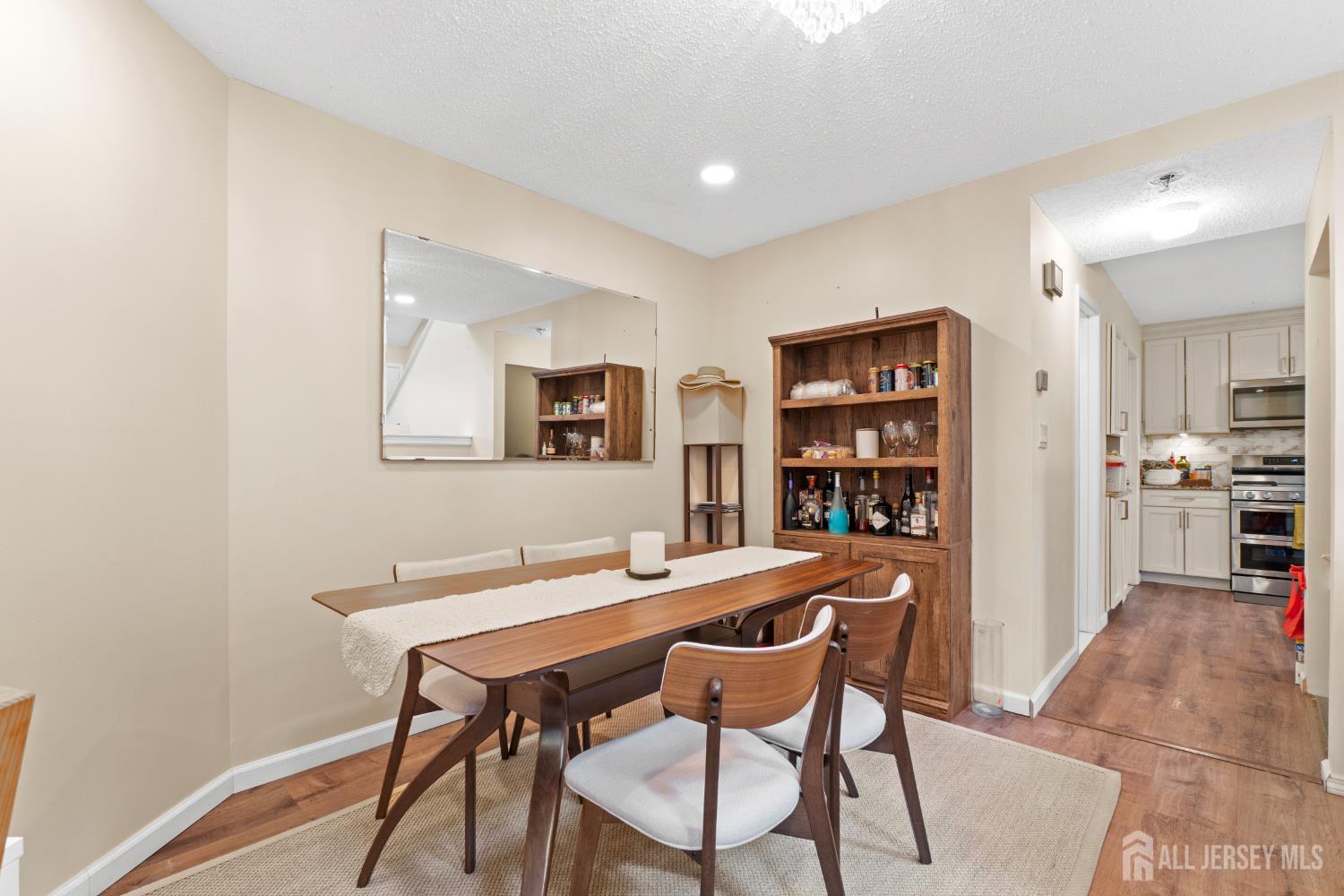 272 Westgate Drive Edison, NJ 08820 - Photo 16 of 47 a view of a dining room with furniture