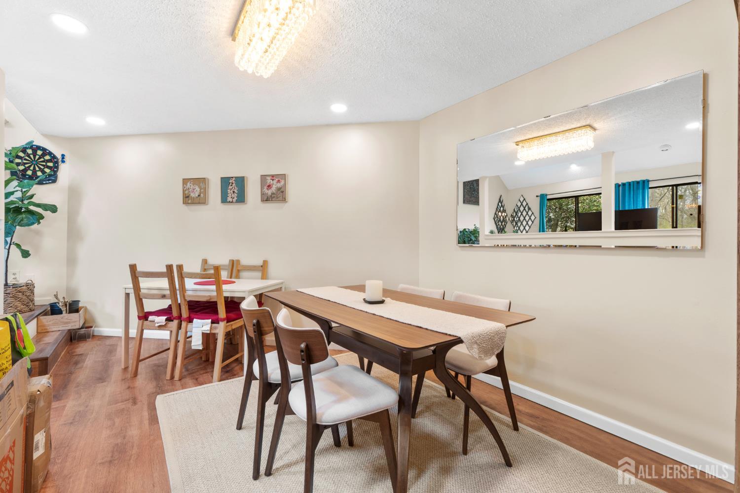 272 Westgate Drive Edison, NJ 08820 - Photo 17 of 47 a view of a dining room with furniture and wooden floor