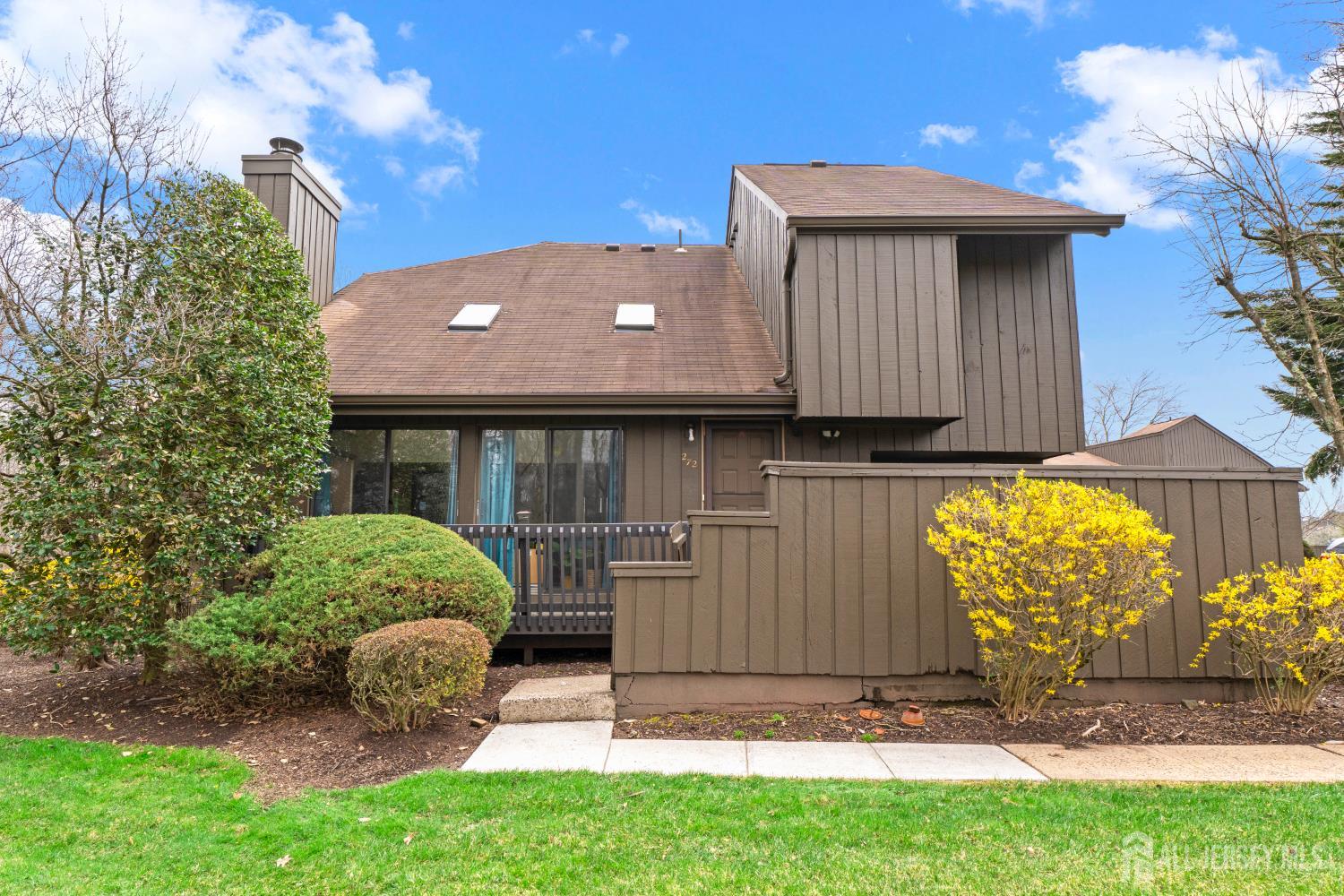 272 Westgate Drive Edison, NJ 08820 - Photo 3 of 47 a front view of house with a yard