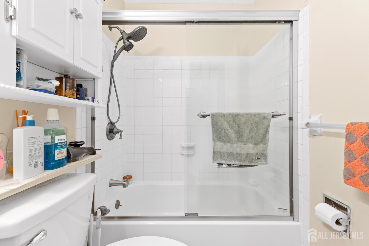272 Westgate Drive Edison, NJ 08820 - Photo 32 of 47 a bathroom with a bathtub and a shower
