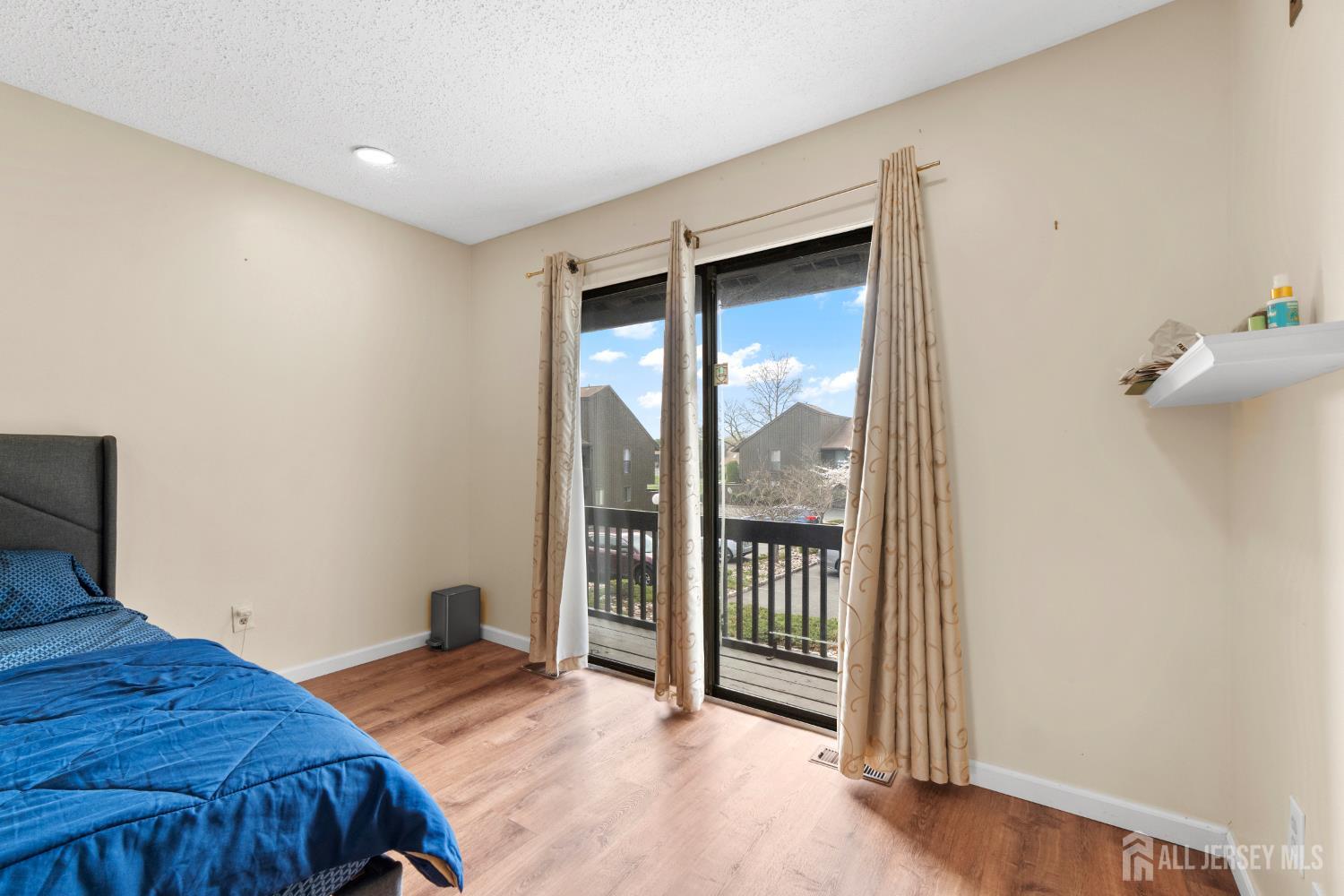 272 Westgate Drive Edison, NJ 08820 - Photo 35 of 47 a bedroom with a bed and a window