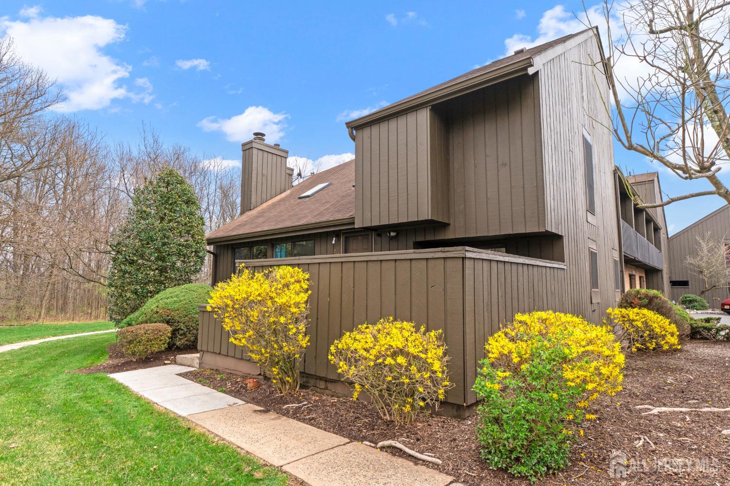 272 Westgate Drive Edison, NJ 08820 - Photo 4 of 47 a view of a back yard of the building