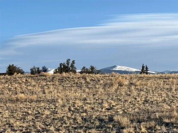 a view of ocean and mountain