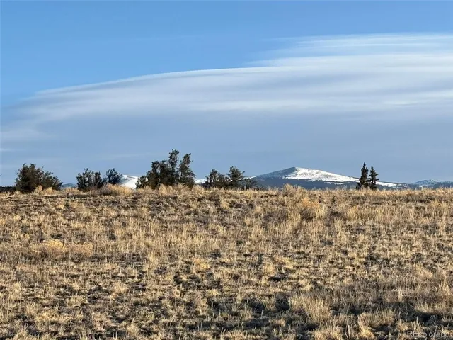 a view of ocean and mountain