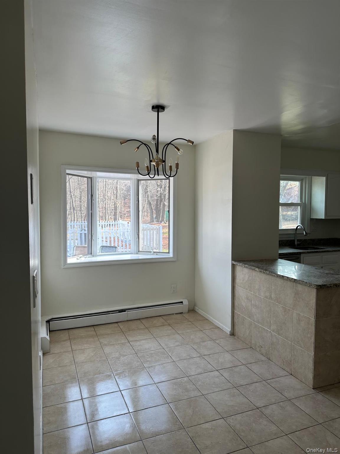 273 Prospect Road Monroe, NY 10950 - Photo 2 of 2 a view of a kitchen with a sink and a window