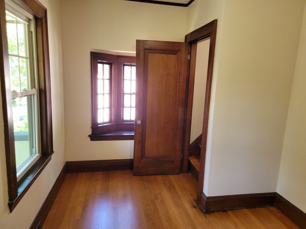 133 Fairview Avenue, Unit 133 Belmont, MA 02478 - Photo 15 of 33 a view of front door with wooden floor
