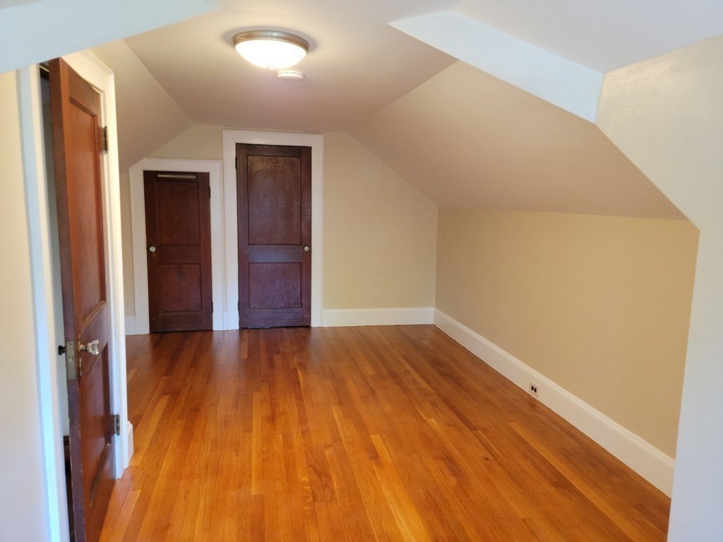 133 Fairview Avenue, Unit 133 Belmont, MA 02478 - Photo 20 of 33 wooden floor in a hall with an entryway