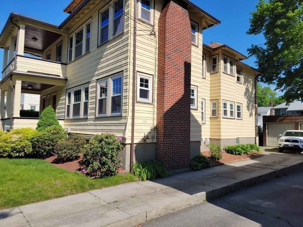 133 Fairview Avenue, Unit 133 Belmont, MA 02478 - Photo 23 of 33 a view of a white building among the street