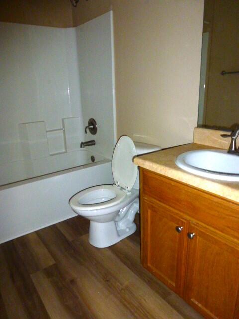 2829 Shoni Drive Navarre, FL 32566 - Photo 26 of 33 a bathroom with a toilet and a sink