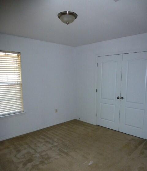 2829 Shoni Drive Navarre, FL 32566 - Photo 27 of 33 a view of an empty room and a window