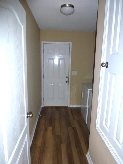 2829 Shoni Drive Navarre, FL 32566 - Photo 28 of 33 a view of a hallway with wooden floor