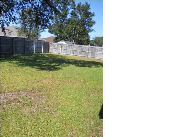 2829 Shoni Drive Navarre, FL 32566 - Photo 32 of 33 a view of a backyard