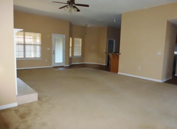 2829 Shoni Drive Navarre, FL 32566 - Photo 7 of 33 an empty room with windows and closet