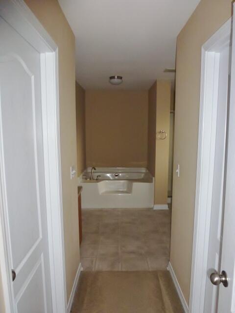 2829 Shoni Drive Navarre, FL 32566 - Photo 10 of 33 a bathroom with a bathtub