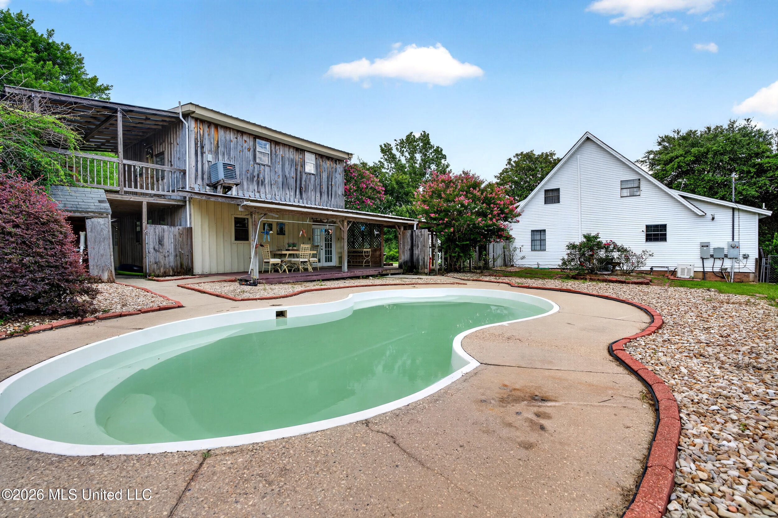 574 Slade Woodward Road Poplarville, MS 39470 - Photo 45 of 106 45_backyard_pool
