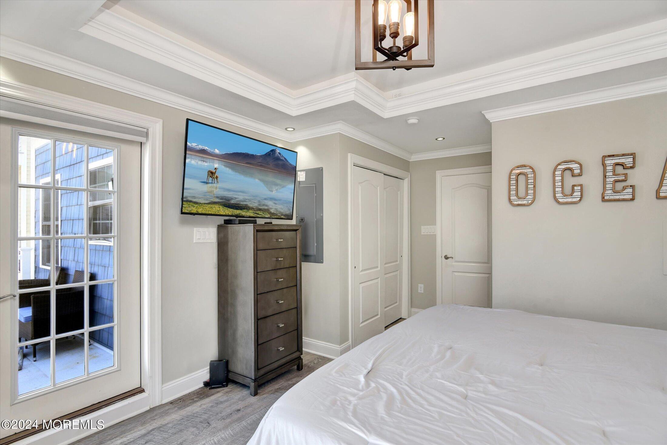 5 Fielder Avenue Seaside Heights, NJ 08751 - Photo 31 of 55 a bedroom with a bed and a window