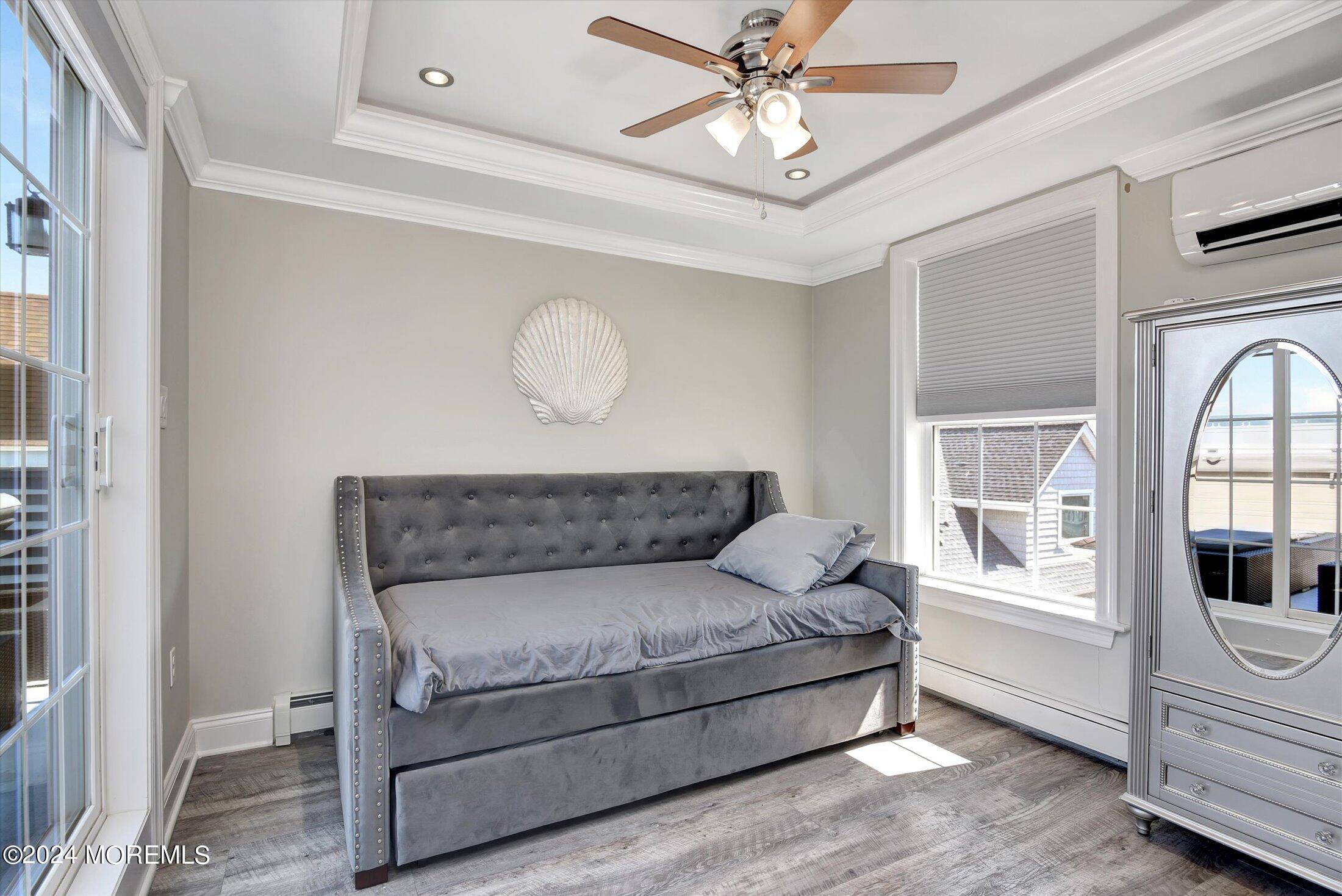5 Fielder Avenue Seaside Heights, NJ 08751 - Photo 33 of 55 a living room with a bed furniture and kitchen view