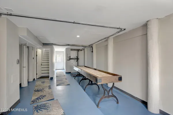 a view of a living room and balcony