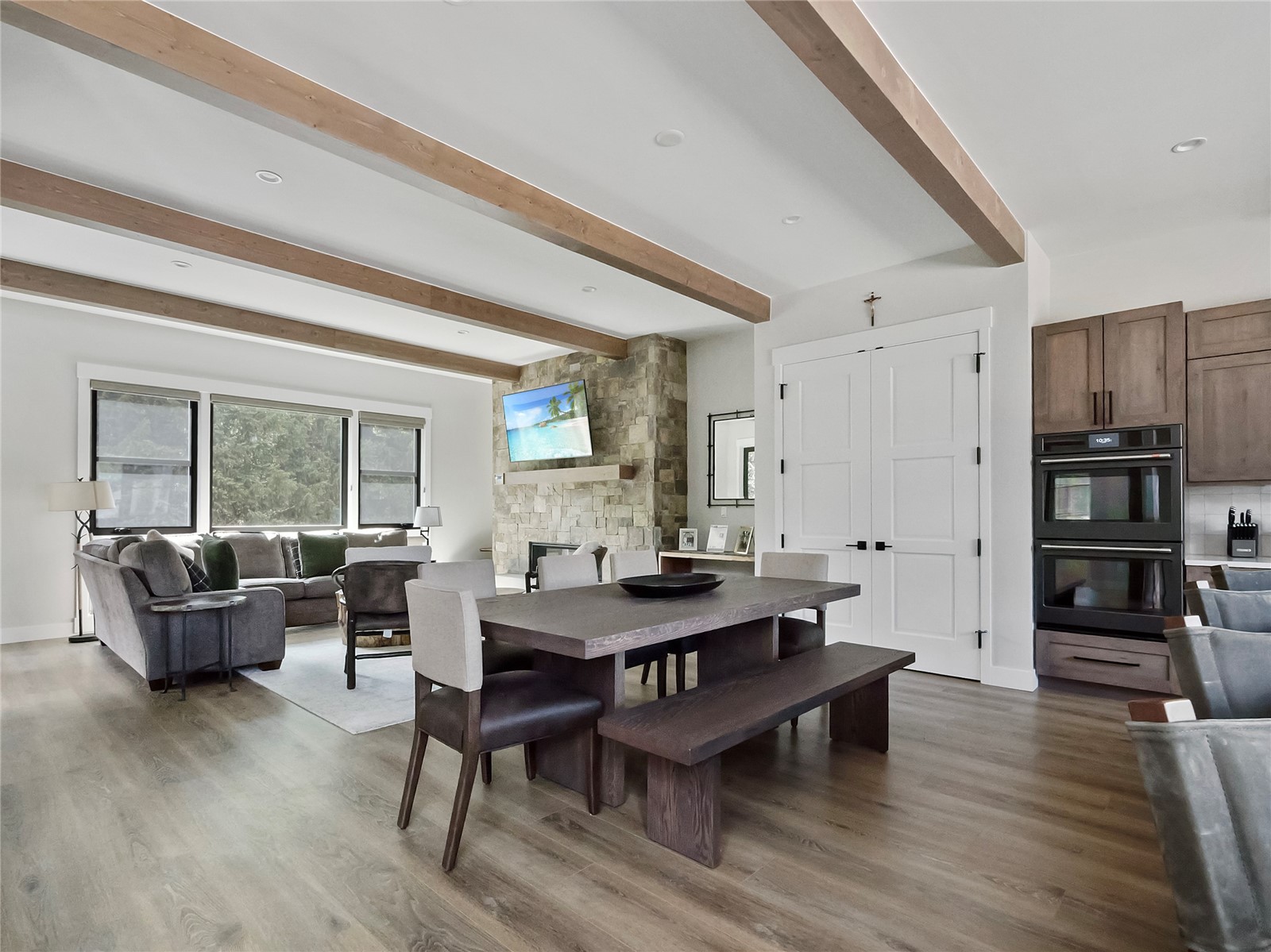 75 Alcove Court, Unit 75 Keystone, CO 80435 - Photo 4 of 40 a view of a dining room with furniture window and wooden floor