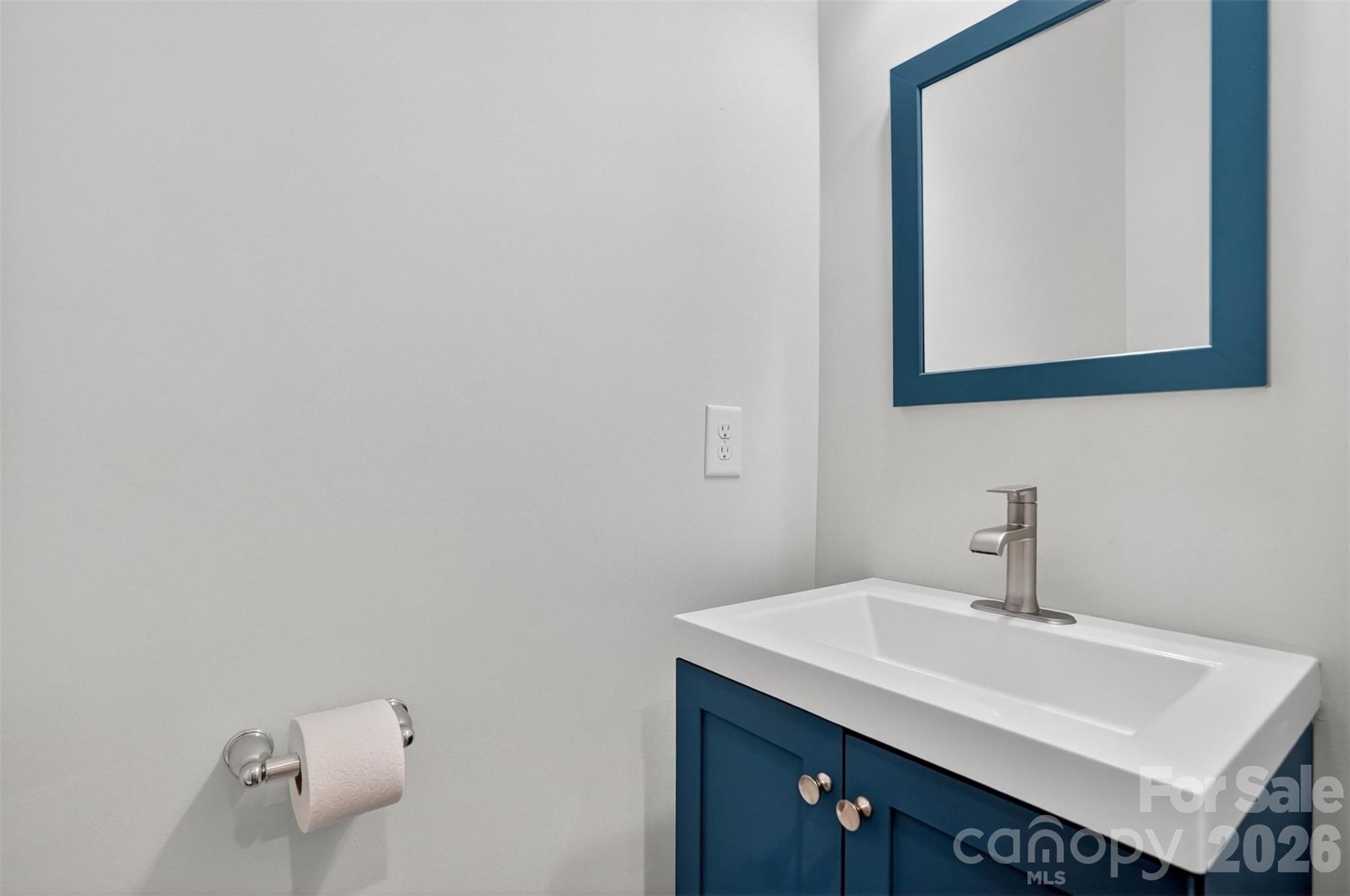 764 River Park Road Belmont, NC 28012 - Photo 11 of 27 a bathroom with a sink and a mirror