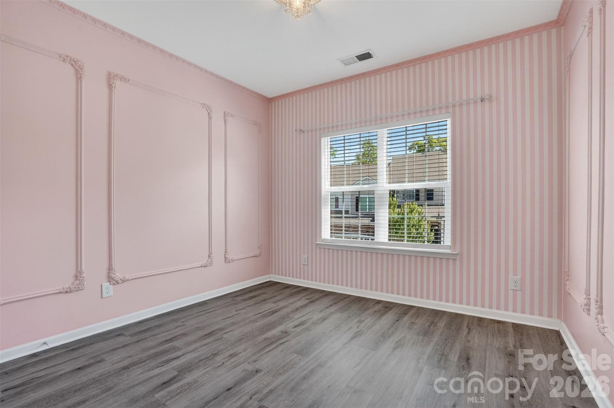 764 River Park Road Belmont, NC 28012 - Photo 15 of 27 an empty room with wooden floor and windows